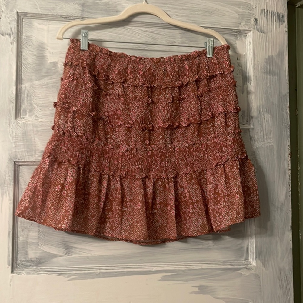 Baevely fitted mini skirt. Brown and pink.